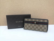 GGキャンバスラウンドファスナー長財布|GUCCI
