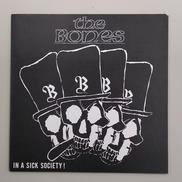 THE BONES/IN A SICK SOCIETY!|NOISE ROOM RECORDS