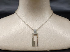 スクエアGモチーフロゴプレート|GUCCI